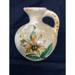 Lille vase m blomster